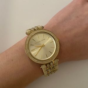 Michael Kors white and gold women’s wrist watch